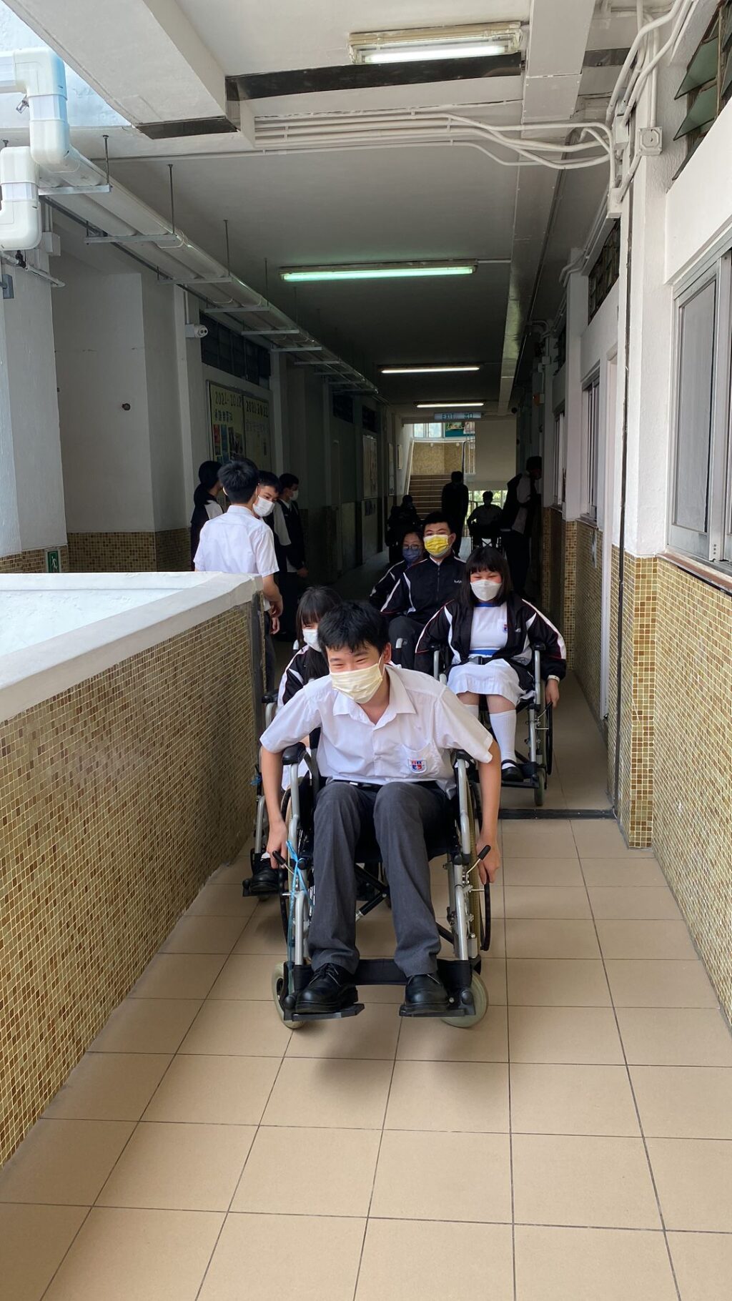 Students are learning to use a wheelchair.