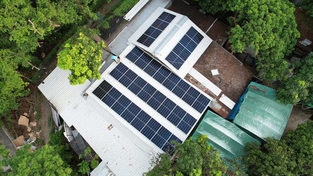 An aerial view of solar panels at Hope House Organization.